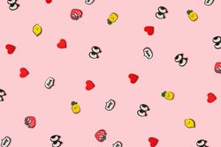 Pattern made of pop art symbols on pastel pink background