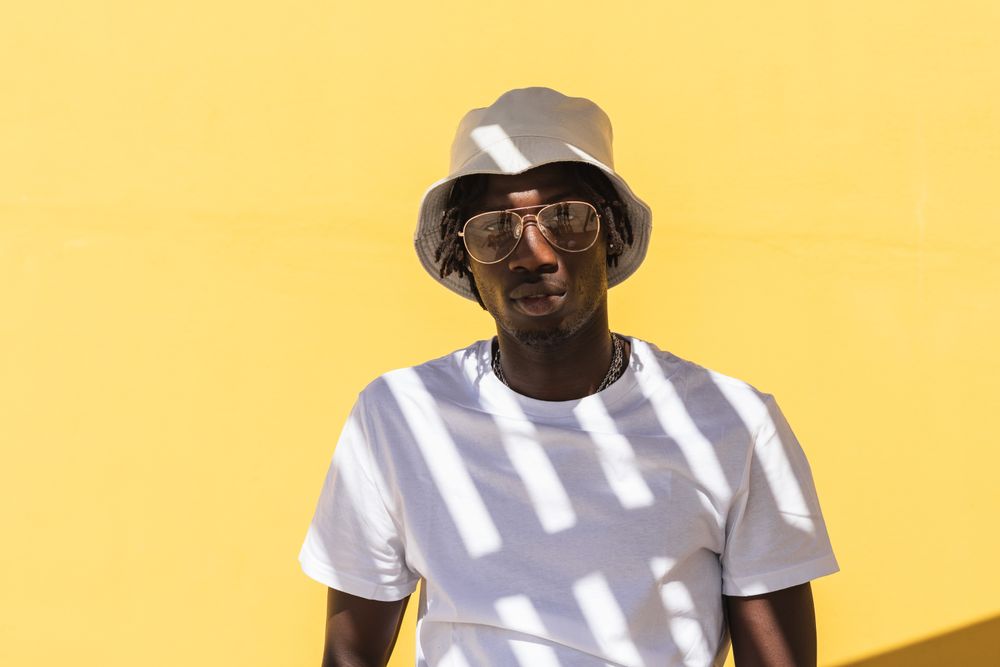 Young Black man in panama hat