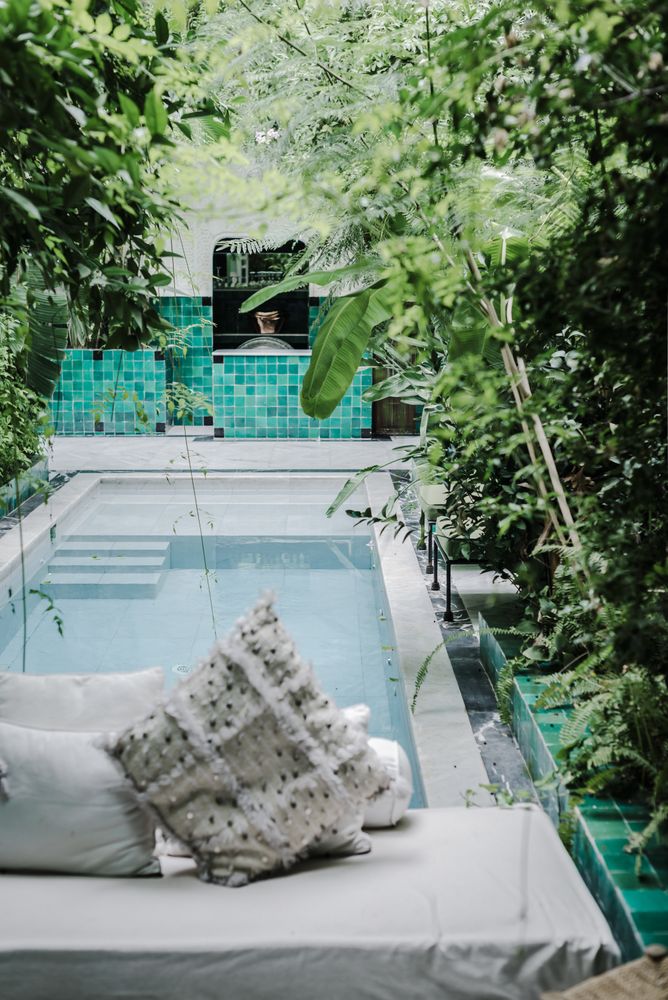Soft bench near pool in garden