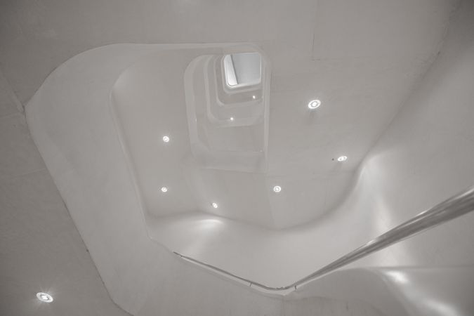 Amazing modern hall interior with white stairway