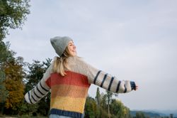 Happy woman enjoying freedom in nature