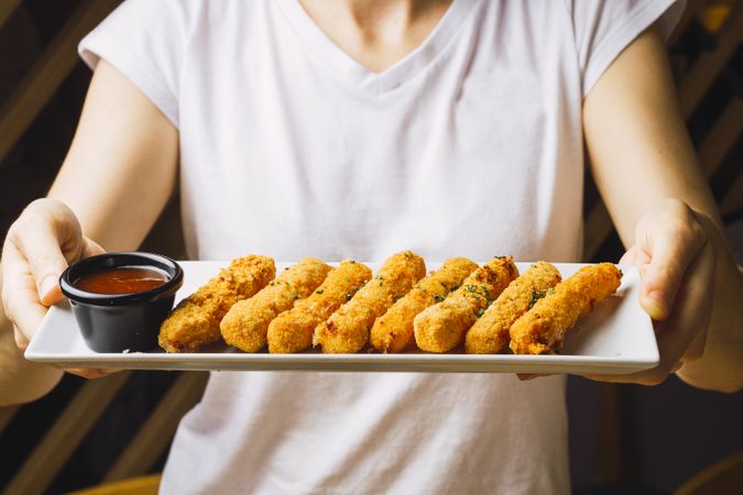 Chicken fillet in batter and red sauce