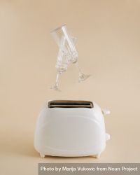 Champagne glasses suspended above a toaster 5o9OGb