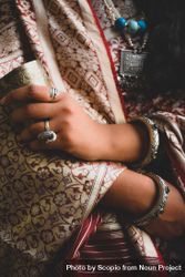 Close-up shot of woman wearing sari holding a cup 41YQp4