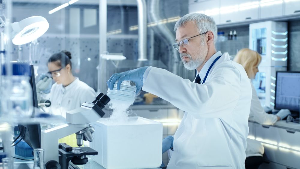 Medical Research Scientist Opens Refrigerator Box Smoke Coming out of it.