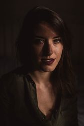 Woman in dark room