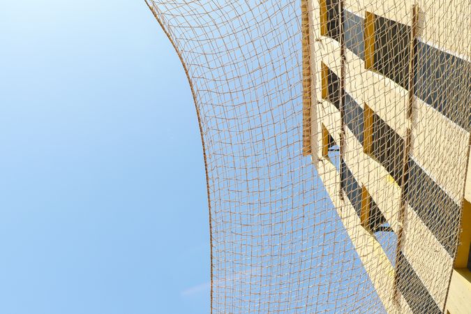 Training fire fighting tower on blue sky background, space for text