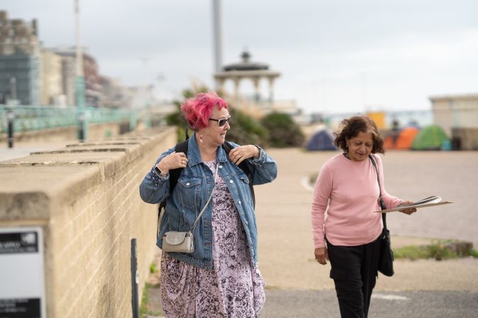 Woman walking away from coast