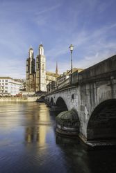 Zurich old bridge and church on a sunny day