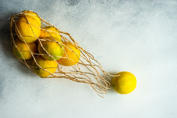 Organic lemons in mesh bag