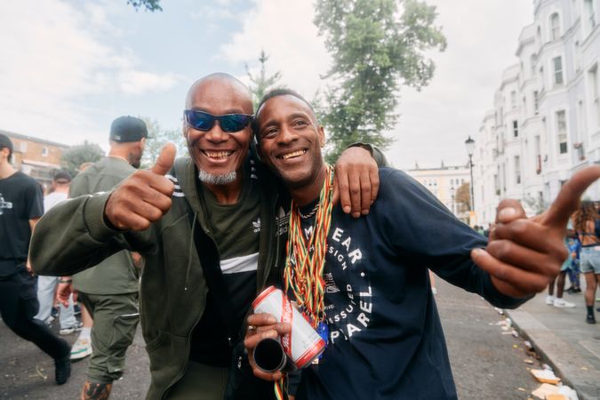 London, England, United Kingdom - August 28, 2022: Two Black male revelers at Notting Hill Carnival