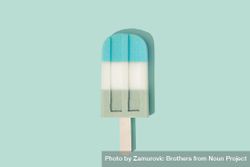 Colorful ice cream popsicle on pastel blue background 5zaYA0
