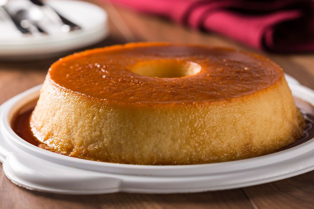 Ring of panna cotta or flan served on table