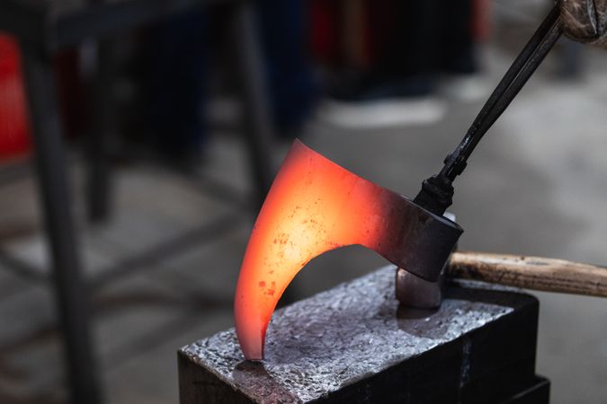 Artisan forging metal axe