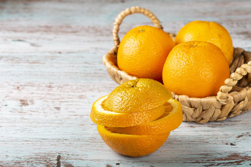 Sliced oranges on the table.