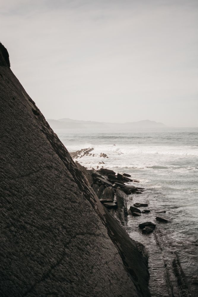 Cliff near stormy sea