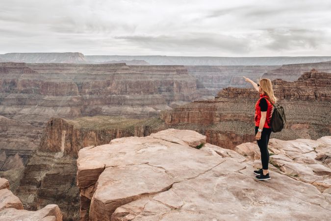 Calm female looking at pictorial landscape