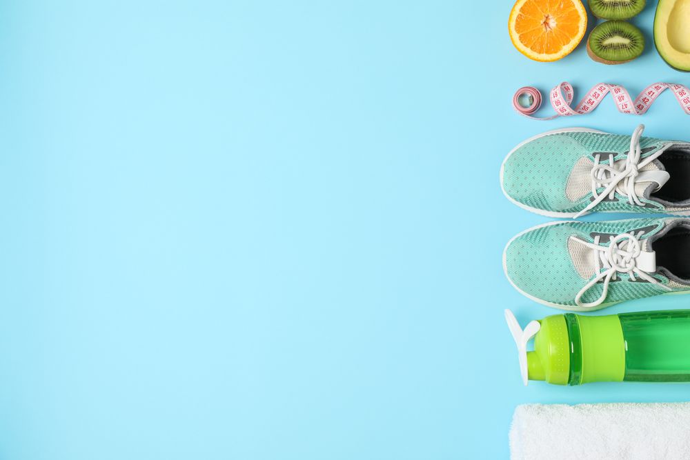 Flat lay composition with loss weigh accessories on color background