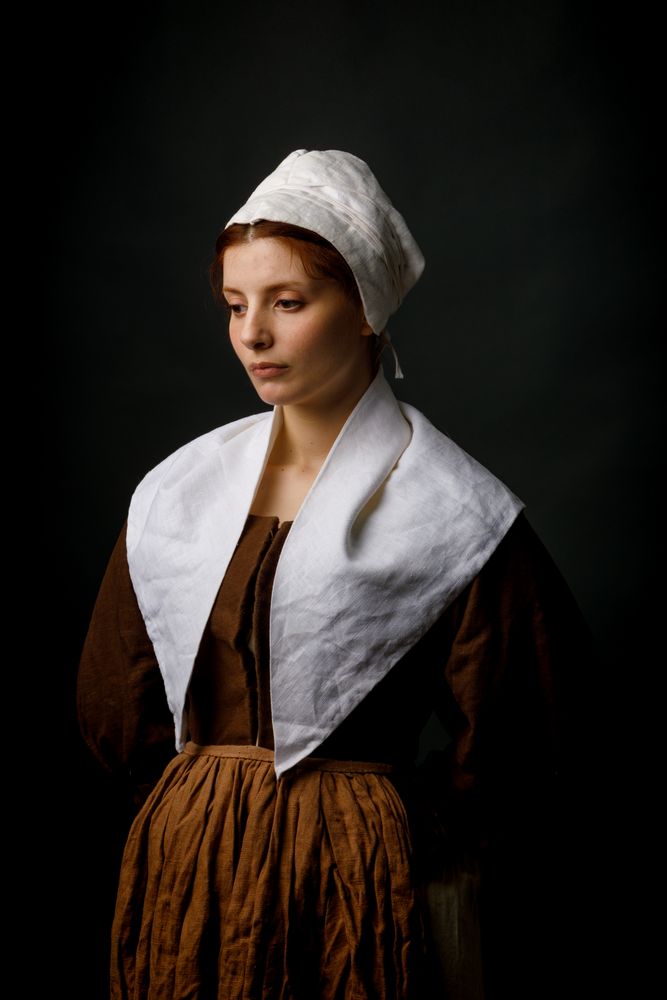 Medieval maid posing in studio