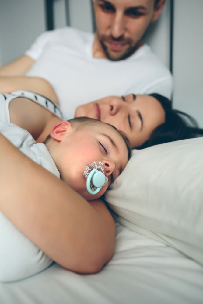 Man looking his wife and son
