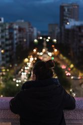 Female tourist enjoying view of ancient town