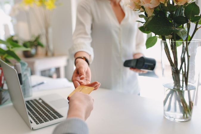 Florist accepting debit card for payment from client