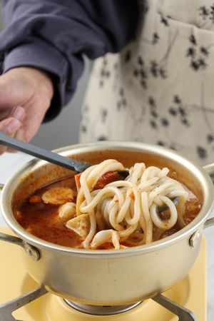 Close Up Boiling Udon on Spicy Sauce