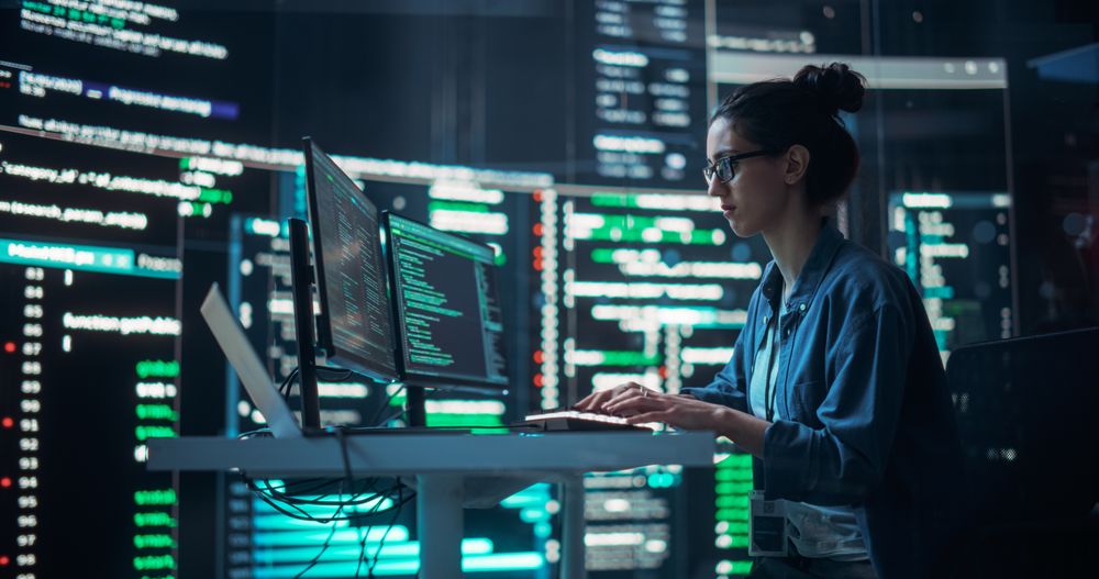 Female Programmer Creating Innovative Software Using AI Data and System