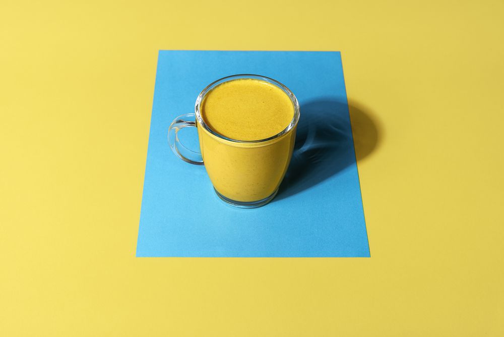 Turmeric latte in sunlight