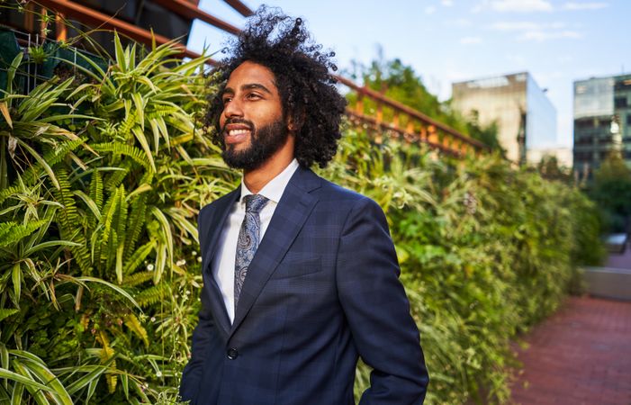 Confident businessman looking away