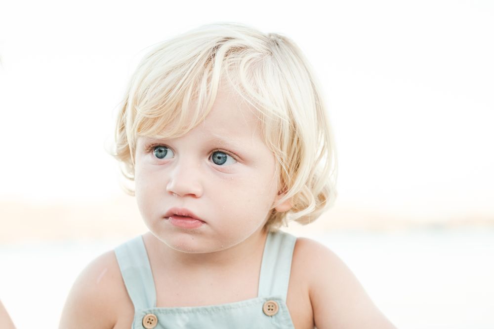 Adorable kid resting at beach