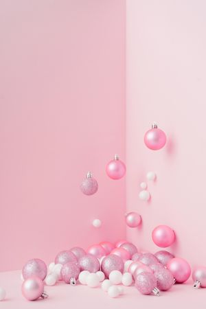 Baubles in a variety of pink shades in corner of pink room