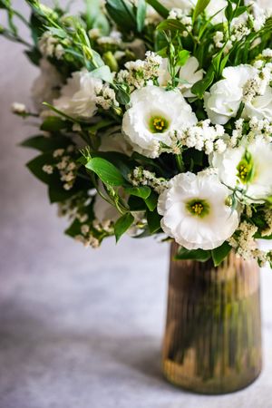 Beautiful white eustoma flowers in bouquet