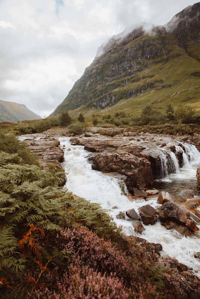 Mountain river with stones on daytime