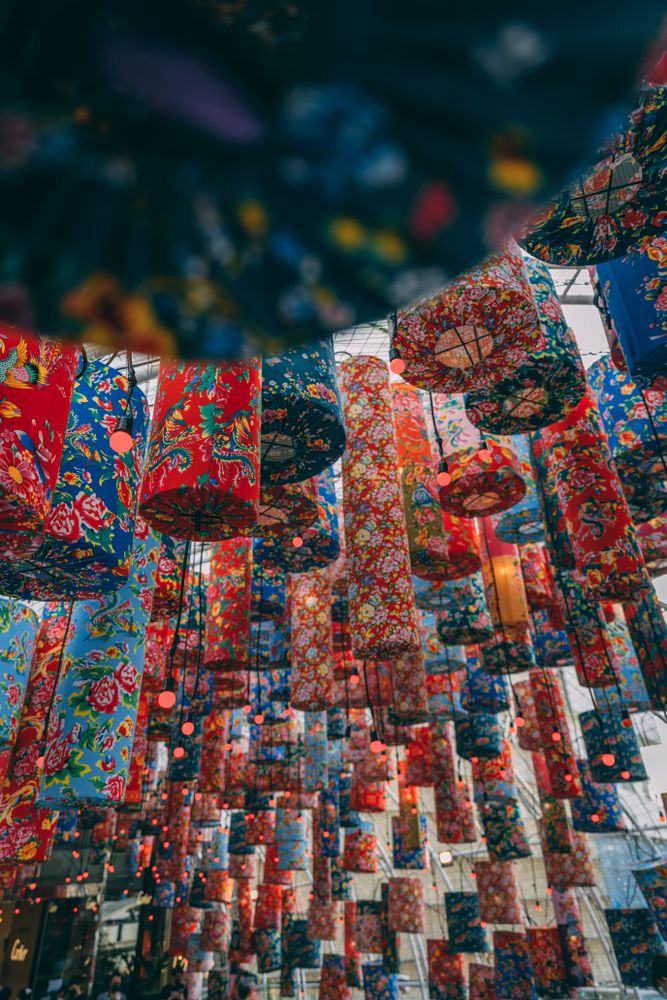 Low angle view of colorful lanterns hanging from ceiling