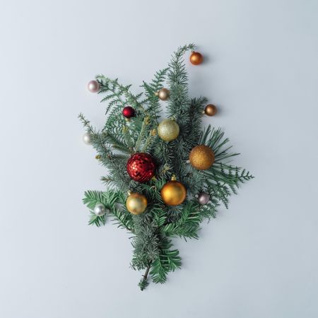 Winter branches arranged with Christmas bauble decorations
