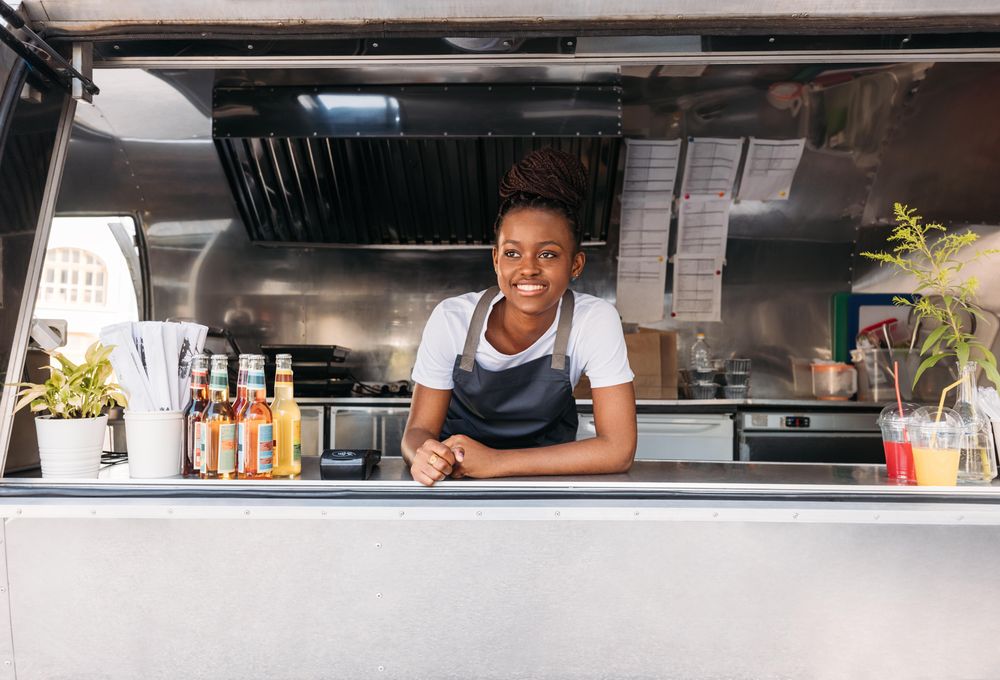 Portrait of young saleswoman waiting for clients