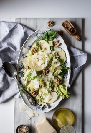 Gourmet salad with fruits, cheese and nuts