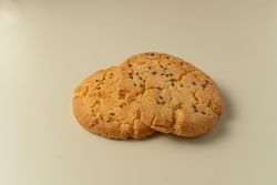 Sesame topped cookies arranged neatly