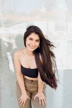 Woman standing near wall