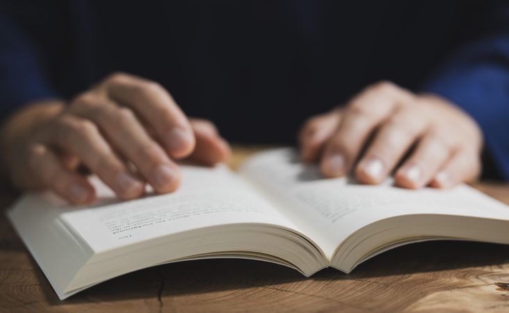 Man Reading Book Close-Up