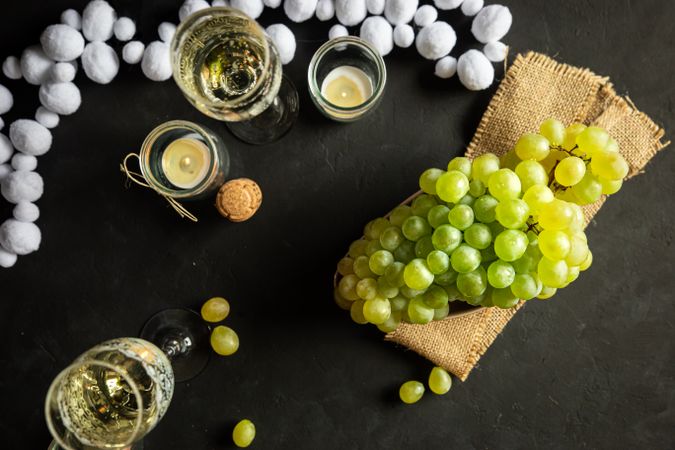 Glasses with wine and grapes