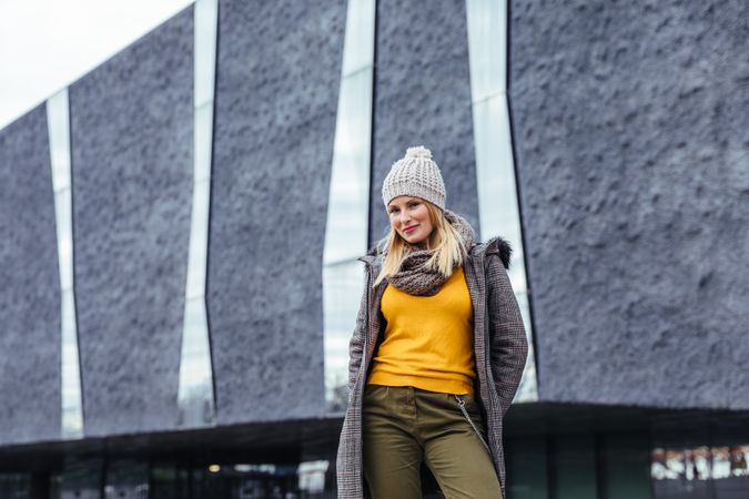 Blonde woman posing in the city