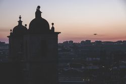 Dusky view of cathedral against cityscape