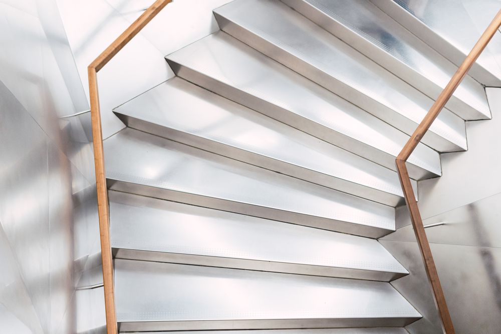 Staircase with railings in corridor