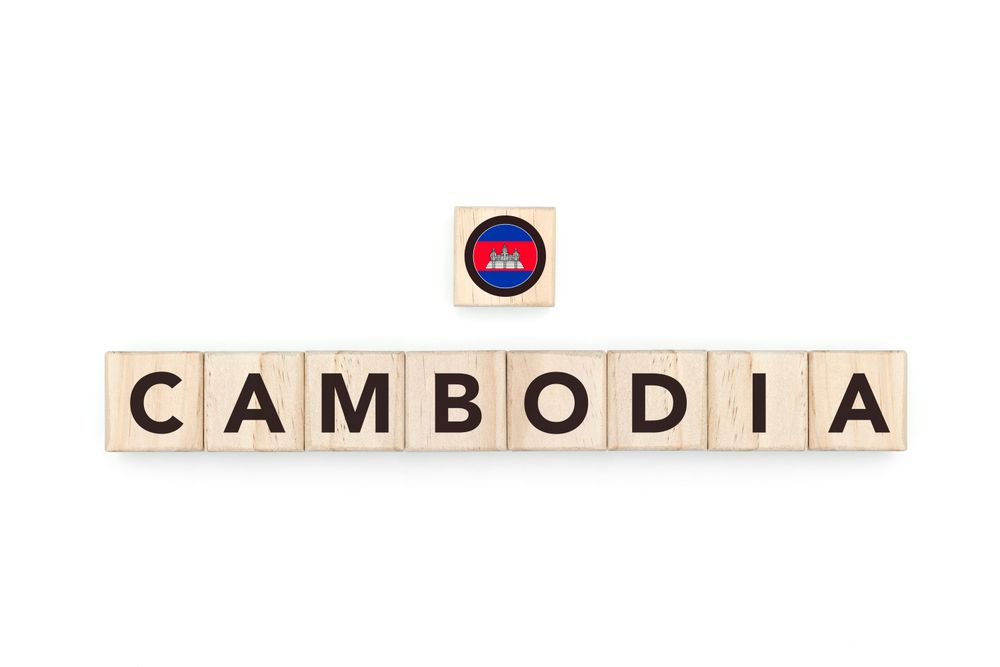 Wooden blocks bearing the name and flag of Cambodia. Cambodian and Asian Culture, national identity, travel, and geography in a copy space design.