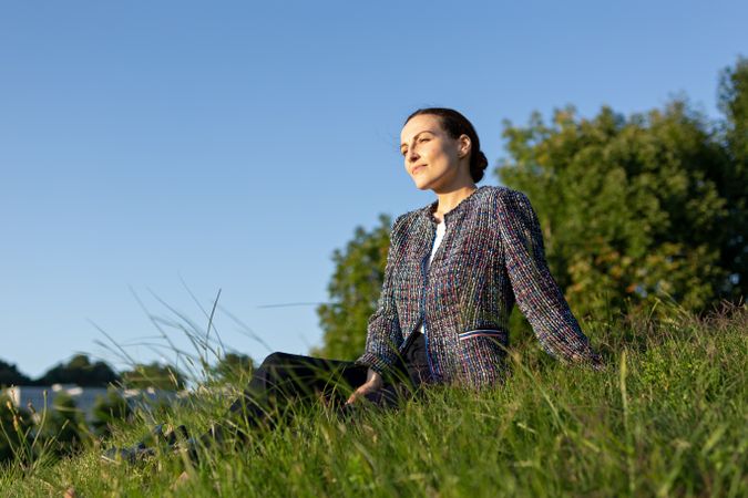 Female manager resting in park