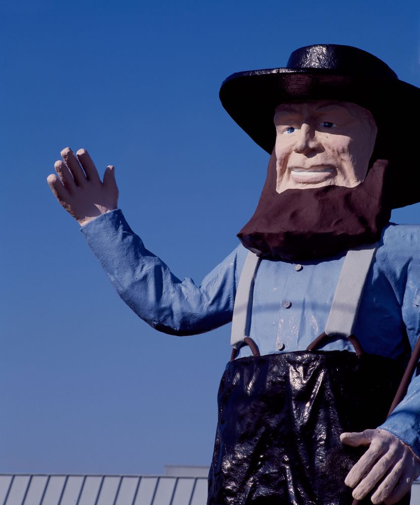 Giant Amish man statue at the Pennsylvania Dutch Visitors Bureau in Lancaster, Pennsylvania