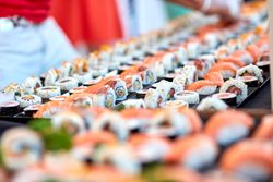 Various rolls on counter in supermarket