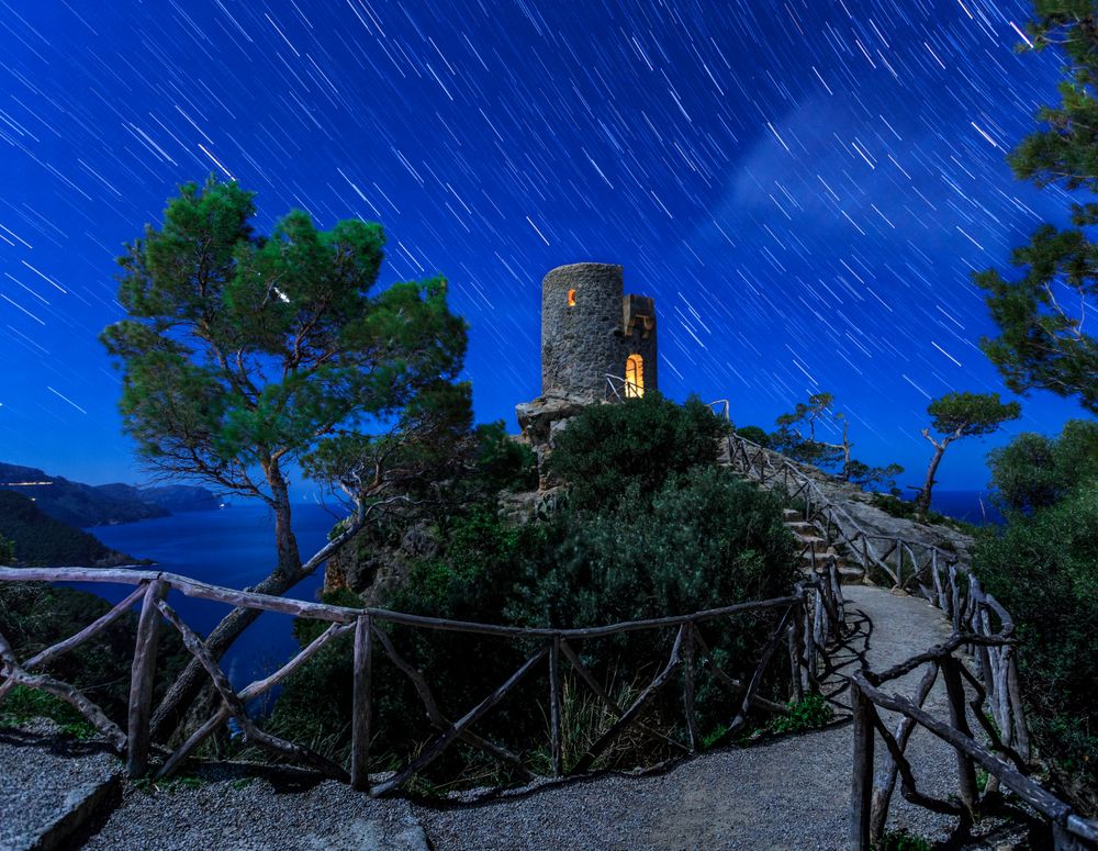 Castle on cliff at night